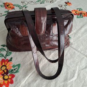 Vintage rich brown genuine eel skin doctor style handbag.